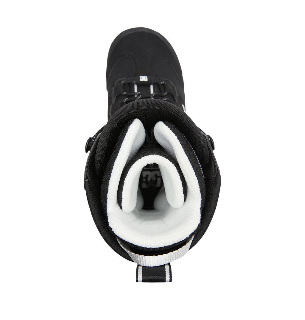 Top view of the DC Shoes Men’s Premier Hybrid BOA® Snowboard Boot in black, showcasing a white inner lining and pull tab at the back, and featuring the innovative BOA® Fit System, isolated on a white background.