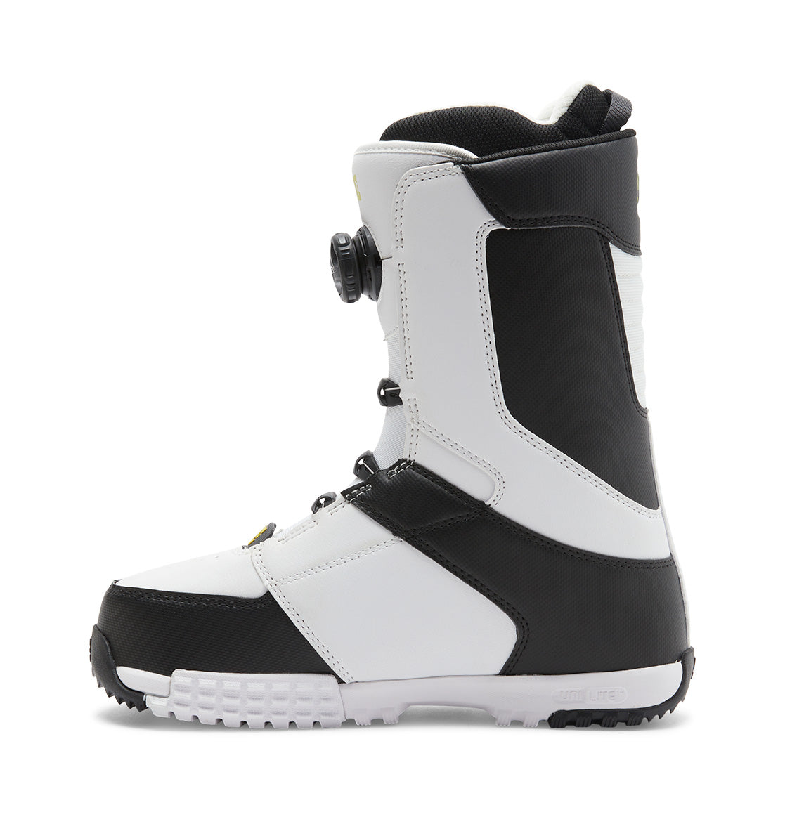 A side view of the DC Shoes Men’s Control BOA® Snowboard Boots, featuring a white and black all-mountain design with a textured sole, high ankle support, and a Dual Zone BOA® Fit System dial closure, set against a plain white background.