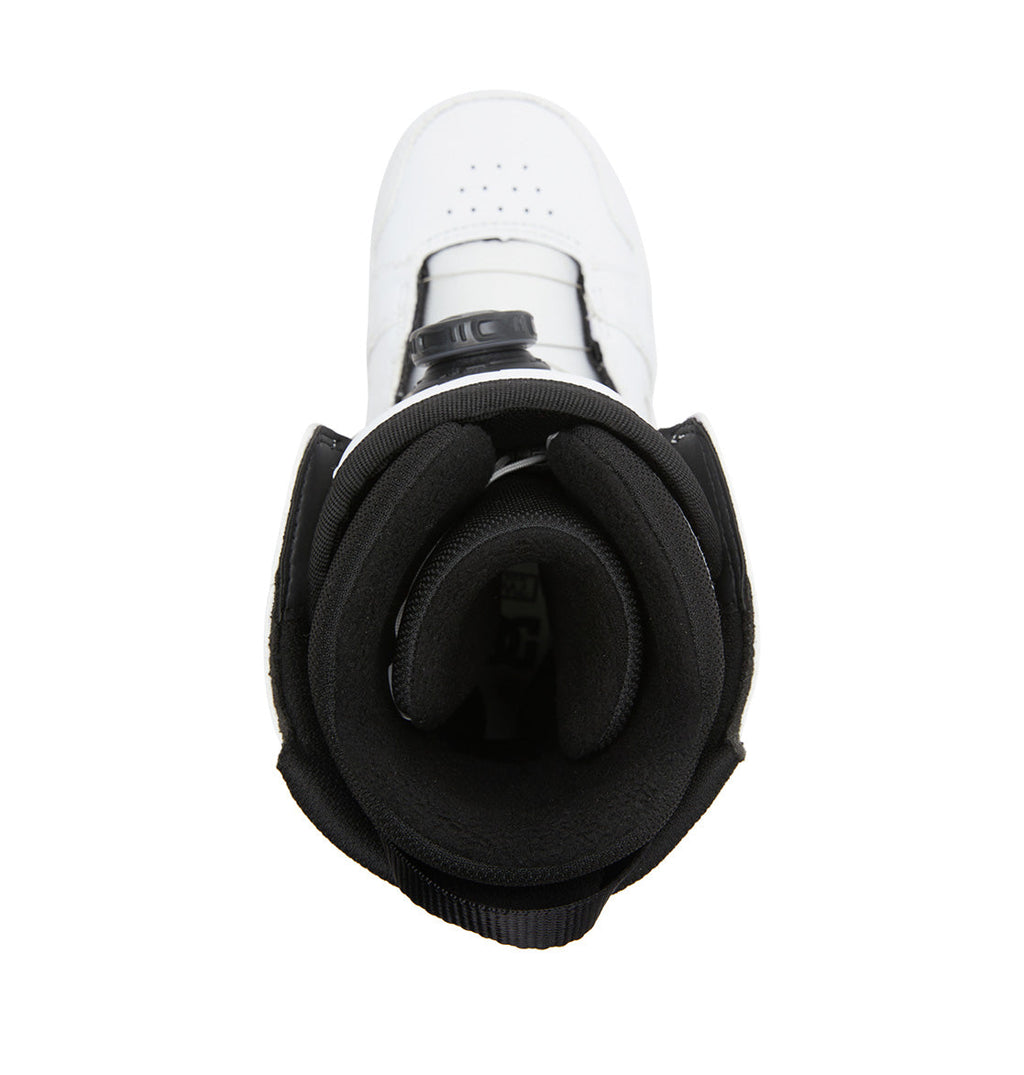 Top-down view of the DC Shoes Women’s Phase BOA® Snowboard Boots in white and black, featuring a padded black inner lining and prominent tongue with advanced BOA® Fit System technology, set against a white background.