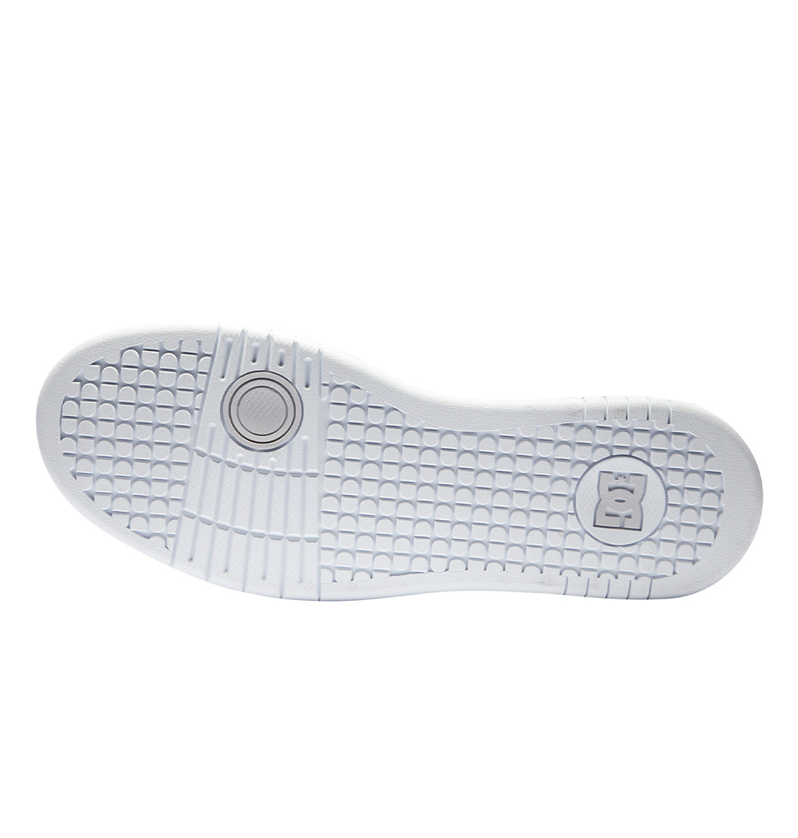 Outsole of the DC Shoes Men’s Manteca 4 HI features a white, durable rubber sole with a textured grid pattern, circular detailing at the ball of the foot, and an embossed DC logo near the heel; shown from below against a clean white background.