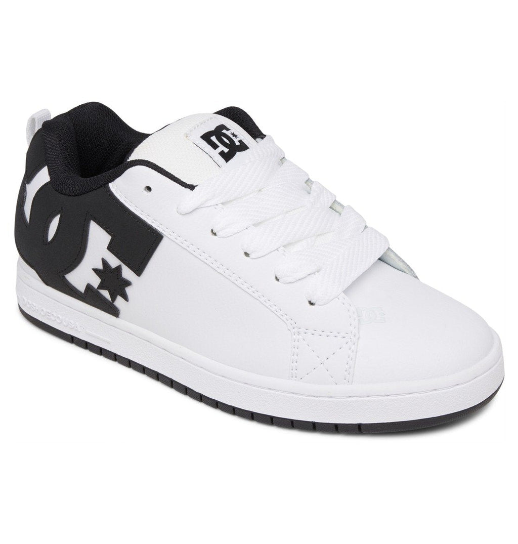 The Men’s Court Graffik Shoes from DC Shoes feature a white upper with black accents, a black sole, and a large black DC logo on the side. These sneakers showcase a puffy silhouette, white laces, and a low-cut design.