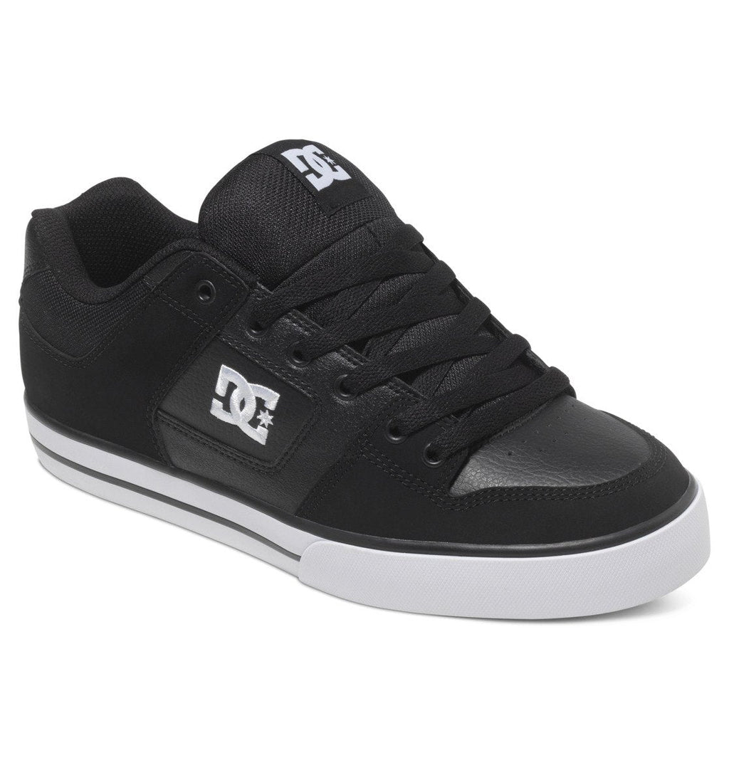 Introducing the Men’s Pure Shoes by DC Shoes—stylish black skate shoes featuring a white logo on the side, contrasting white sole, black laces, and a padded tongue. Designed for comfort, versatility, and standout style.