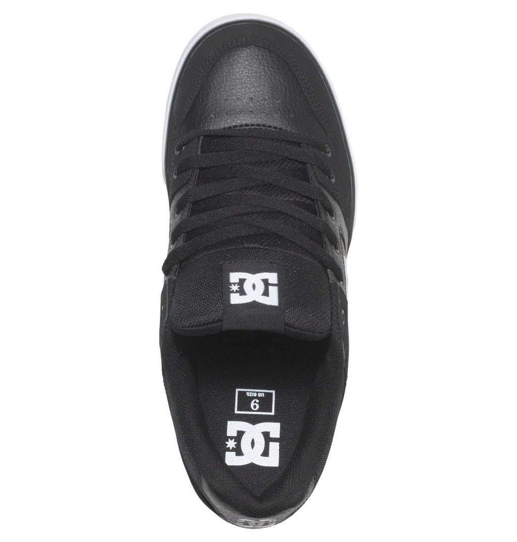 Men’s Pure Shoes by DC Shoes viewed from above, featuring black laces, a tongue with the white DC logo, and an insole marked with size 9. The white sole edges are partially visible around the toe and heel. Designed for everyday wear, these versatile men’s shoes deliver both comfort and style.