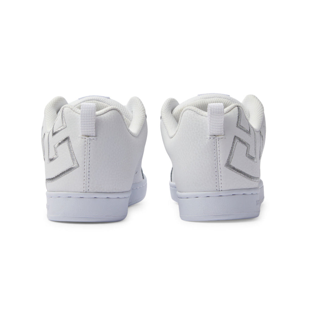 A pair of white DC Shoes Women’s Court Graffik Shoes viewed from the back, featuring a textured surface and large stitched geometric designs on each heel, exuding a nostalgic ’90s style.