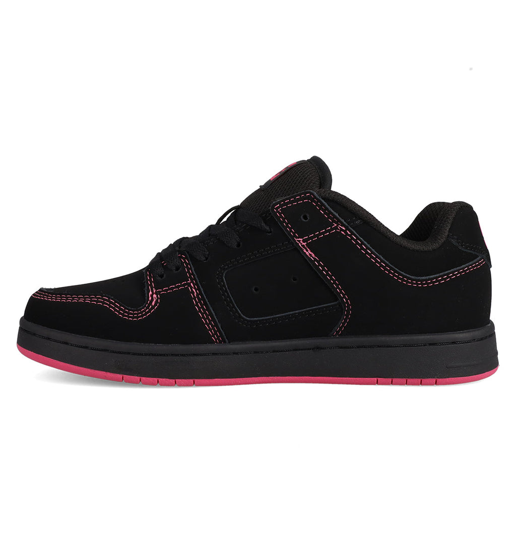 The DC Shoes Women's Manteca 4 features black material with pink stitching and a pink-accented sole, displayed in a side profile against a white background.