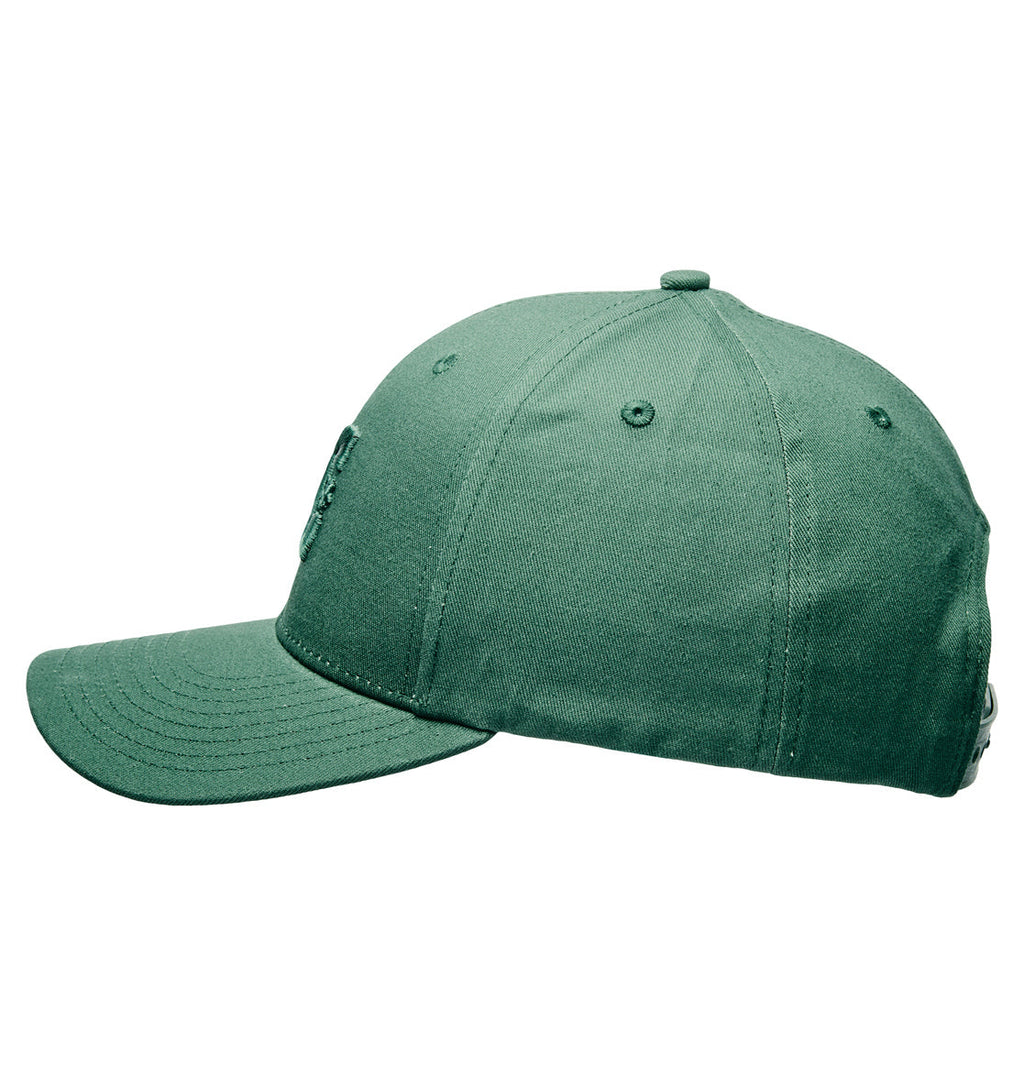 Legacy Star Snapback by DC Shoes shown from the side, featuring green twill fabric with visible stitching details and a curved brim. The cap displays a prominent DC Logo on the front, and includes a button top and ventilation eyelets.