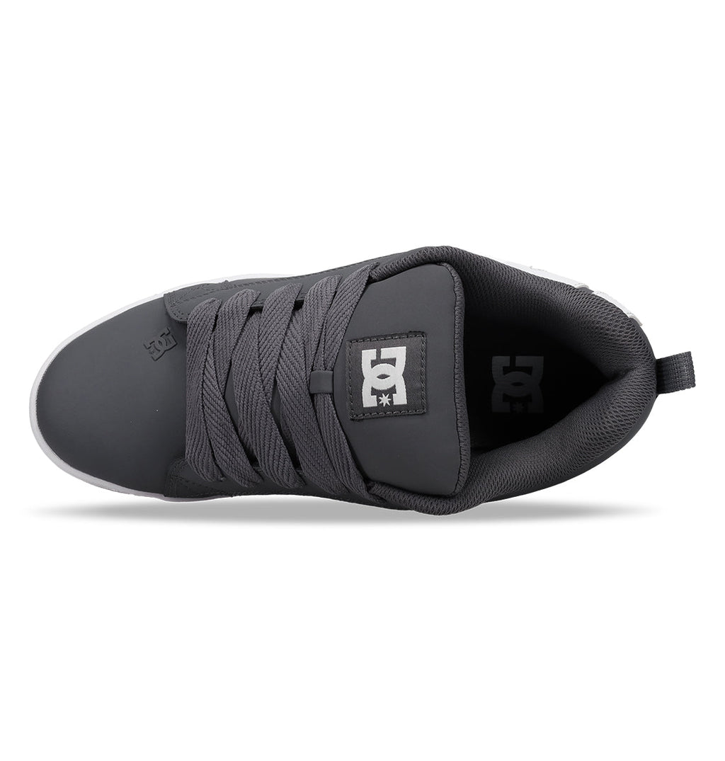 Top view of the DC Shoes Men’s Court Graffik sneaker in dark gray, featuring thick laces and a padded tongue with the DC Shoes logo in white. This chunky skate shoe also includes a heel pull tab and a textured toe area.