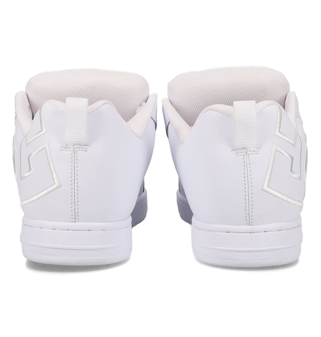 A pair of DC Shoes Men’s Court Graffik Shoes in white, shown from the back with geometric stitching and chunky skate shoe-inspired white soles, placed side by side on a plain white background.