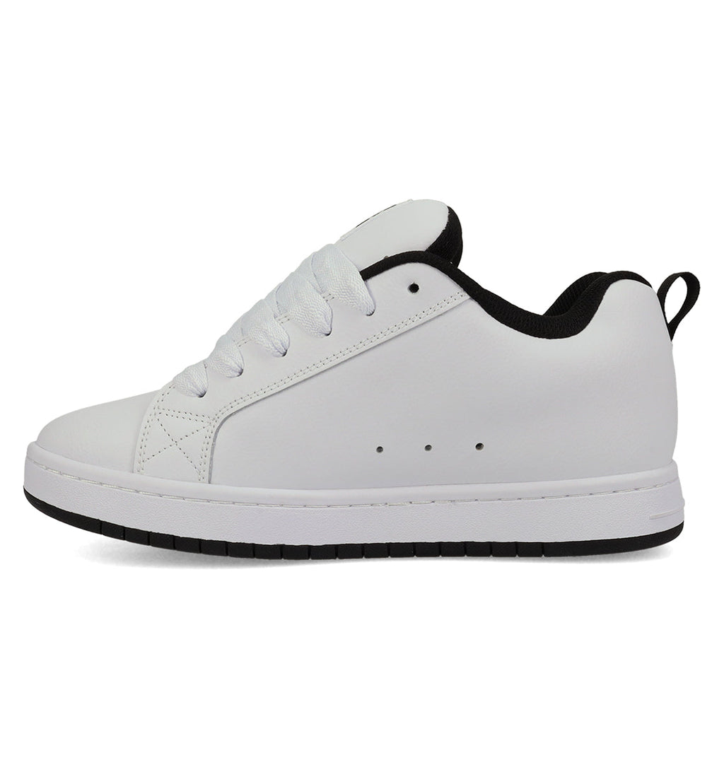 The Men's Court Graffik Shoes by DC Shoes are white low-top sneakers with white laces, a black inner lining, and a black heel pull tab. Their puffy silhouette is inspired by the classic Court Graffik style, shown from the side against a white background.
