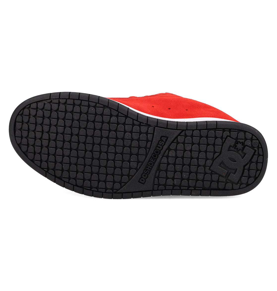 The image shows the black rubber sole of the Men's Court Graffik SE Shoes by DC Shoes, featuring a textured grip and embossed logo near the heel. The sole complements premium upper materials for both durability and style.