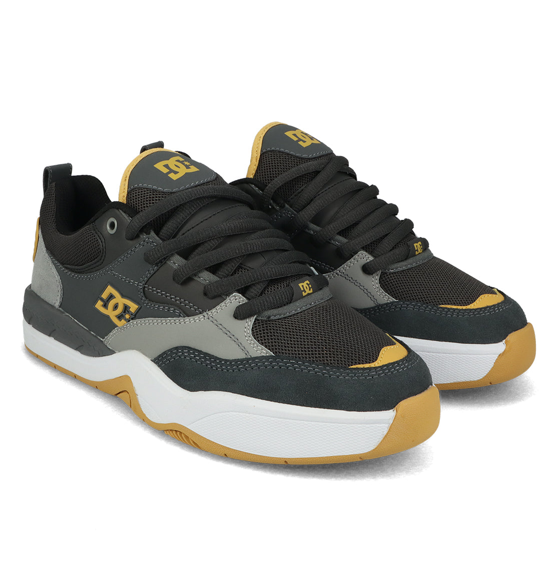 A pair of Men’s Ascend Skate Shoes by DC Shoes in black, gray, and yellow with white soles and black laces, inspired by Josh Kalis and embodying DC DNA, are positioned side by side on a plain white background for a look that balances heritage style with modern comfort.