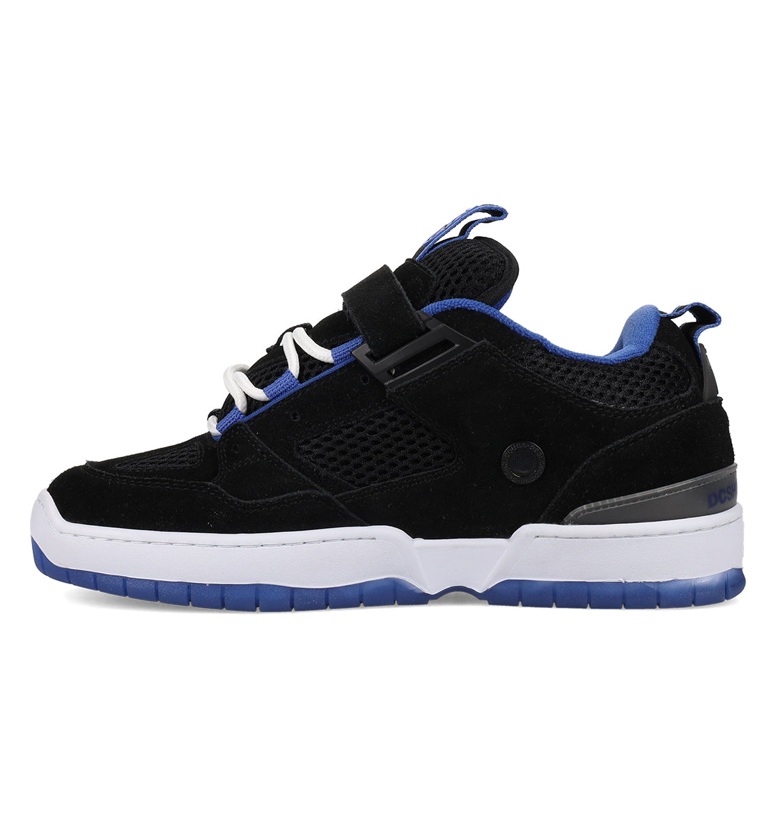 The Men’s JS-1 Shanahan Pro Skate Shoes by DC Shoes feature a black suede upper combined with mesh materials, highlighted by white laces, blue accents, and a white midsole. The low-top design is complemented by foam padded collar for enhanced ankle comfort, while the distinctive blue DC Pill Pattern Outsole delivers signature style and grip.