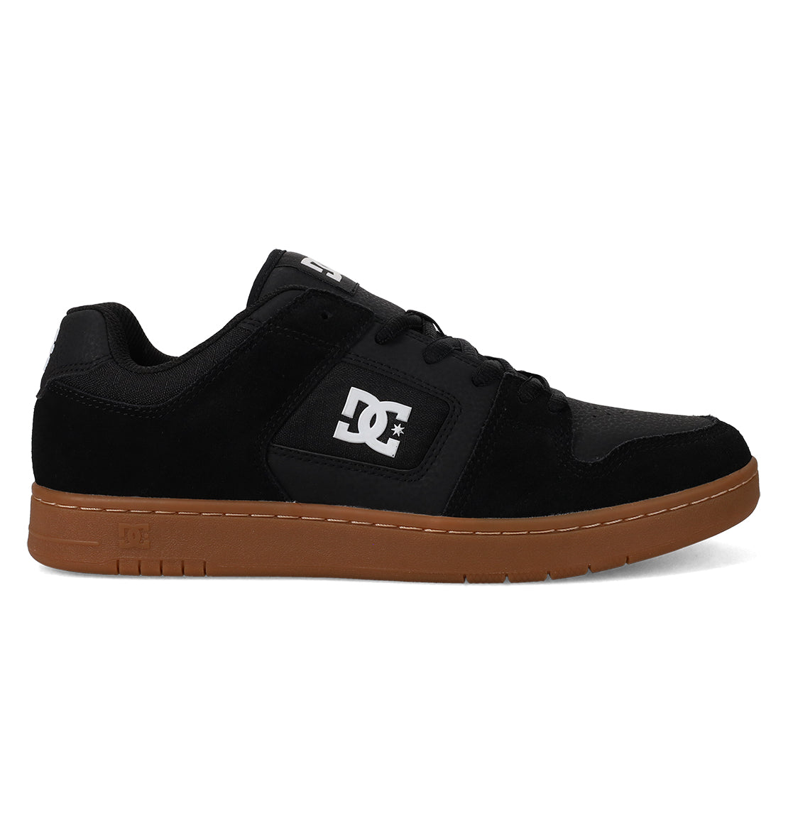 The Men’s Manteca 4 Shoes by DC Shoes are shown from the side on a plain white background, featuring a black upper with a white logo on the side and a brown rubber sole, designed for modern comfort and everyday wear.