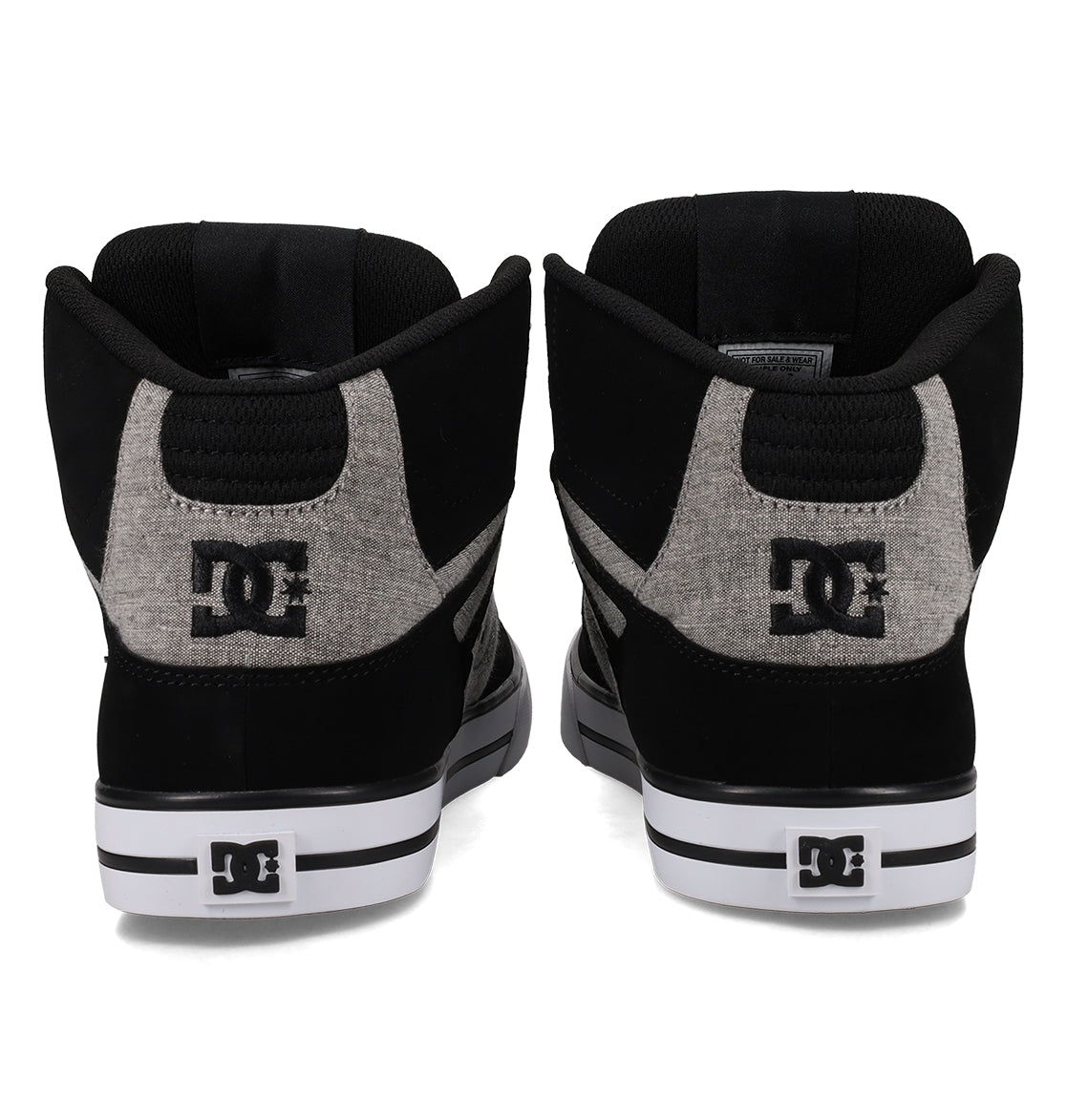 A pair of black and gray DC Shoes Men’s Pure High-Top Shoes is displayed from the back, showcasing the DC logo on the heels and back panels, complemented by white midsoles with black stripes. These durable sneakers are crafted to deliver both style and lasting comfort.