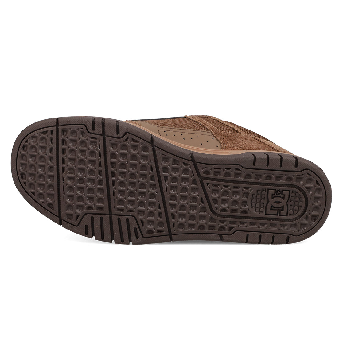 The image displays the brown rubber cupsole of DC Shoes Men's Stag Shoes, with a textured grip and logo by the heel. The upper combines brown suede and leather, making it perfect for skate culture fans.