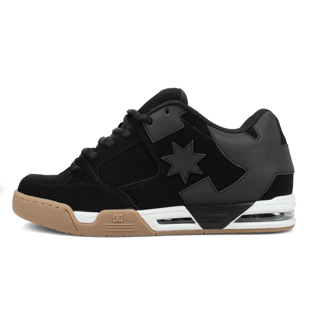 Introducing the Men’s Command Shoes by DC Shoes—a black low-top skate shoe inspired by the classic DC bulk silhouette. Featuring a gum sole, white midsole, and grey star logo on the side, this shoe sports black laces and a mix of suede and leather textures. Signature cushioning ensures all-day comfort and timeless style.
