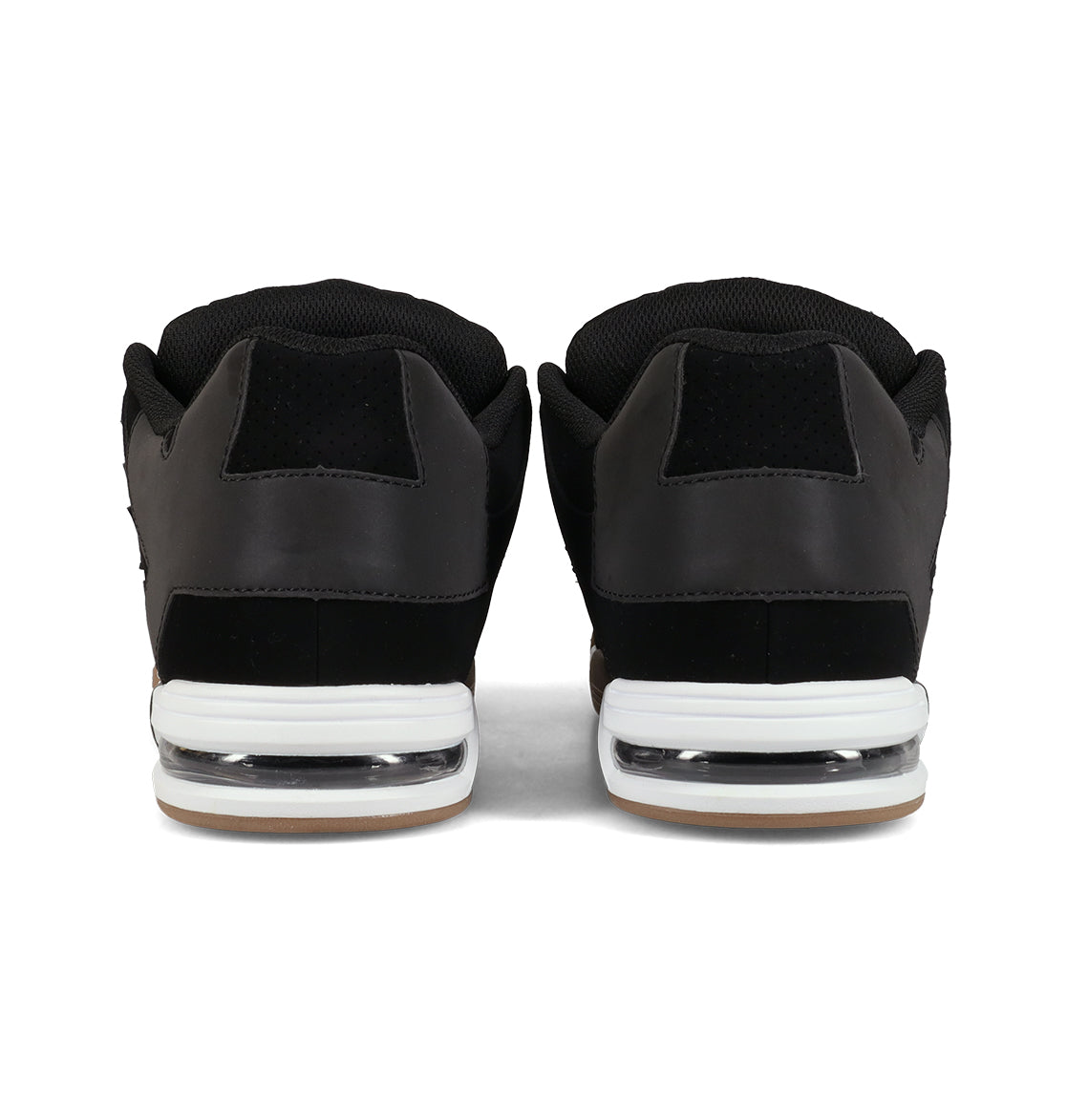 A pair of DC Shoes Men’s Command Shoes in black, viewed from the back, featuring white midsoles with signature cushioning and gum outsoles that capture the classic DC bulk inspired by the Command line.