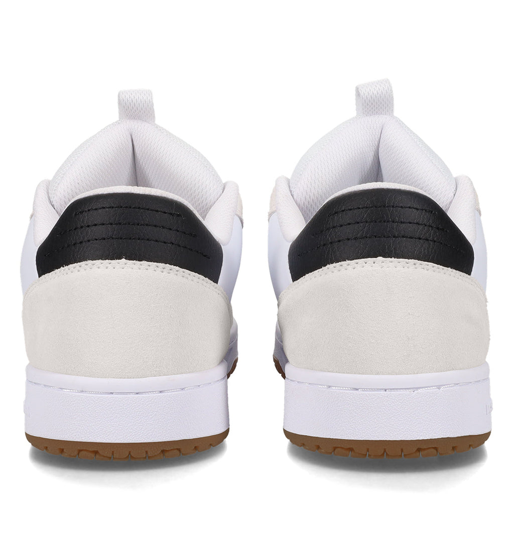 A pair of DC Shoes Men’s Astrix skate shoes in white with black and light gray accents, shown from the back to highlight the heel, white midsoles, and brown outsoles—crafted for street skateboarding and designed to deliver total board control.