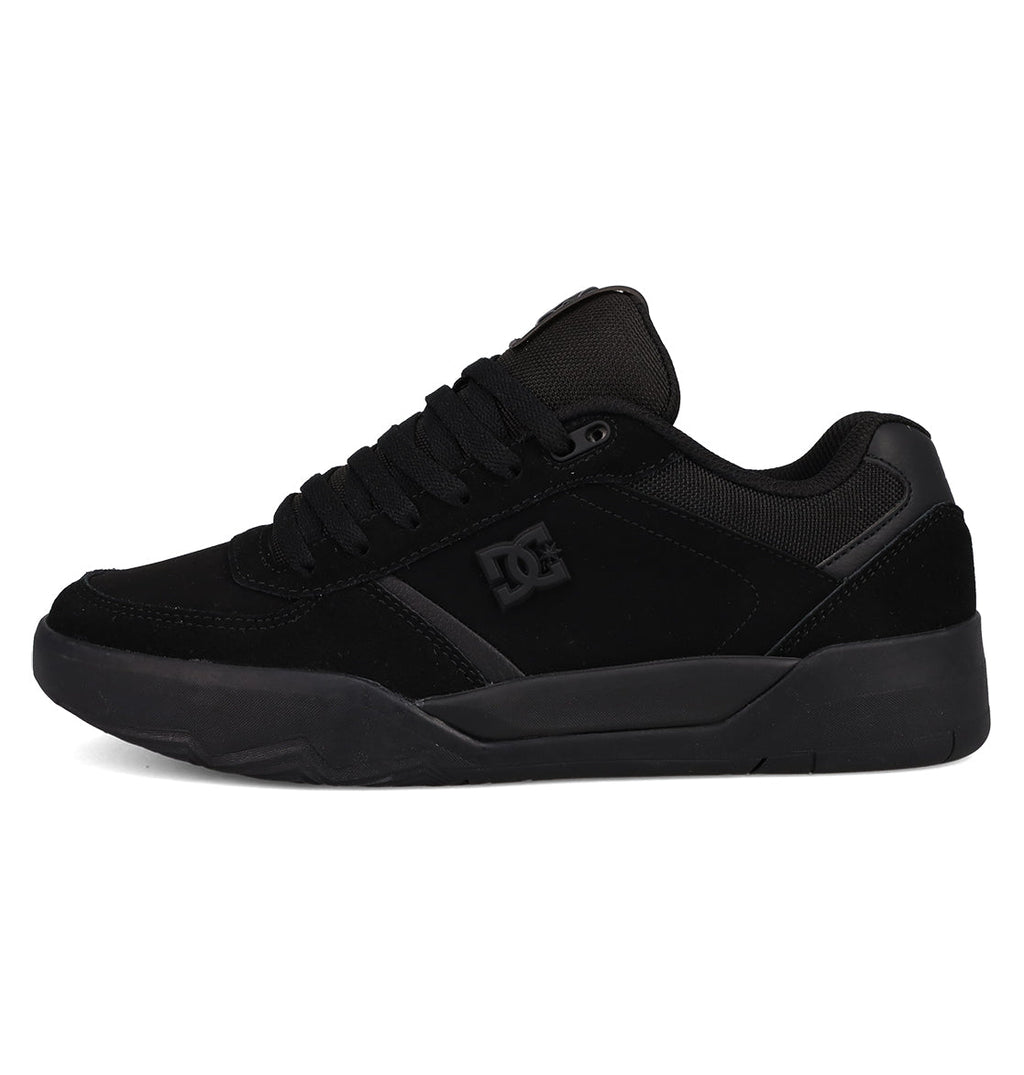 The Men's Fractal Shoes from DC Shoes feature a black low-top design, thick sole, mesh and suede upper, black laces, and the DC logo for performance comfort and street-ready style.