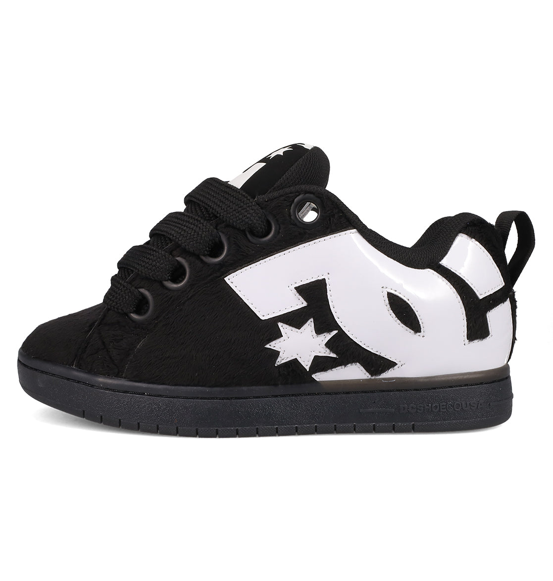 The Men's Court Graffik Puff Shoes by DC Shoes feature a puffy black silhouette, thick black laces, a bold white DC logo with star on the side, an exaggerated upper, and a black sole. Photographed on a plain white background.