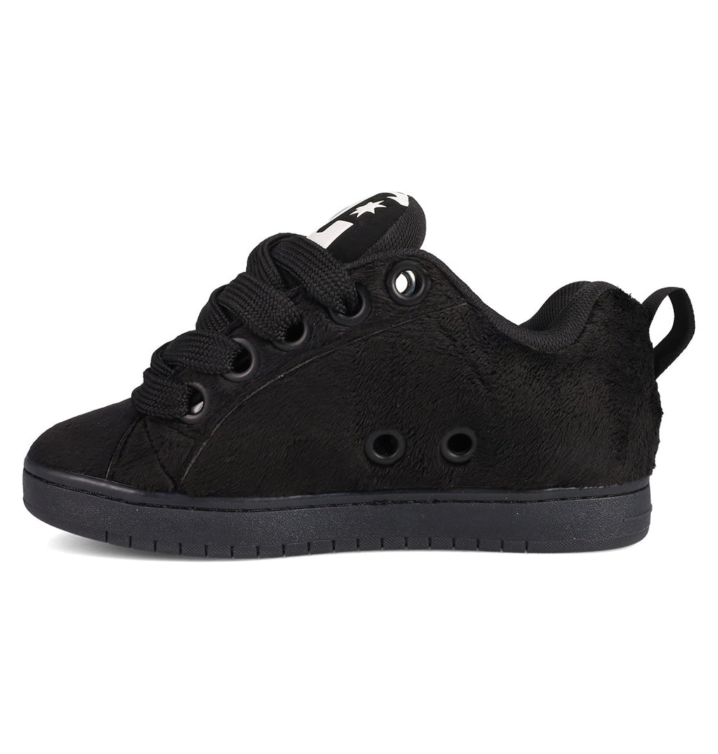 The Men's Court Graffik Puff Shoes by DC Shoes are black low-top sneakers featuring an exaggerated upper, thick laces, textured side, ventilation holes, a pull tab at the back, and a black sole.