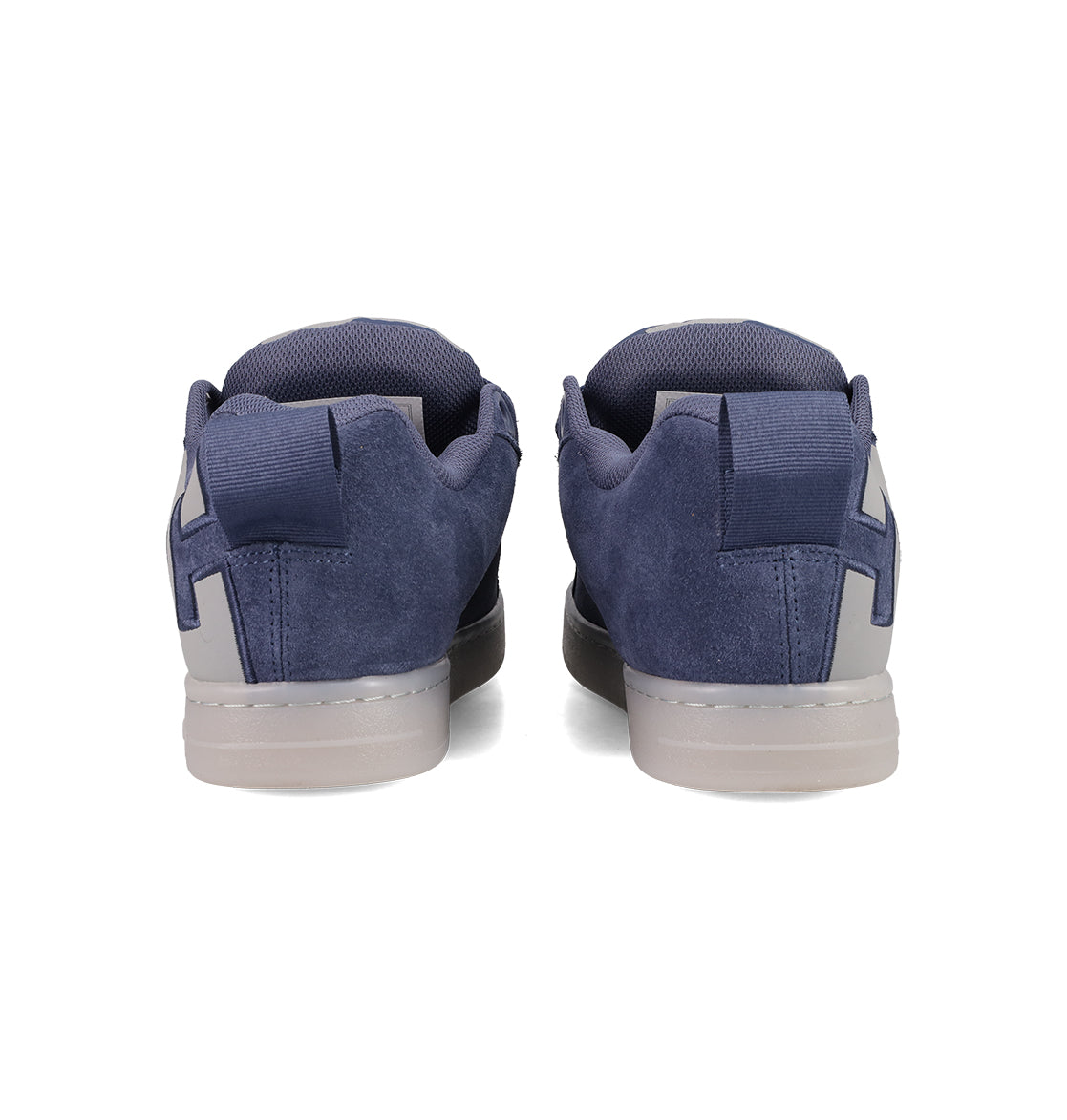 The Men's Court Graffik Shoes by DC Shoes are navy blue suede sneakers with a puffy silhouette, gray heel accents, and a light gray rubber sole, shown from the back against a white background.