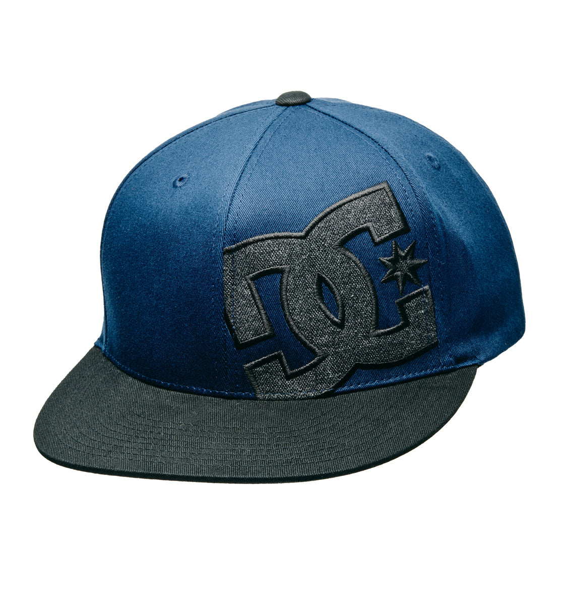 The DC Shoes Offset Flexfit is a blue and black flat-brimmed cap featuring a large black and gray DC logo on the front.