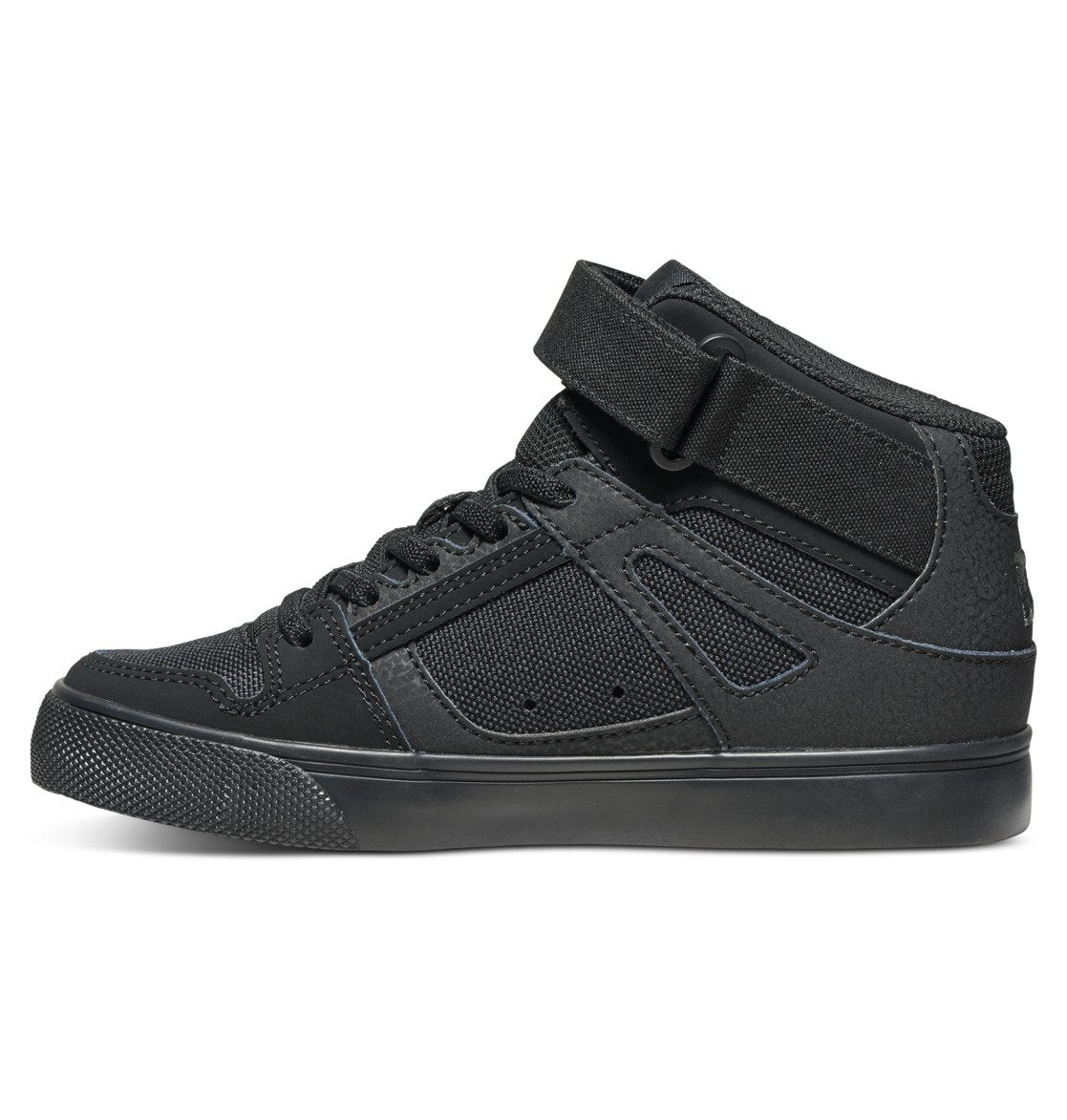 A side view of the DC Shoes Kids’ Pure High Elastic Lace High-Top Shoes in black, featuring a textured sole, mesh panels, and an ankle strap secured above the laces, displayed on a white background.