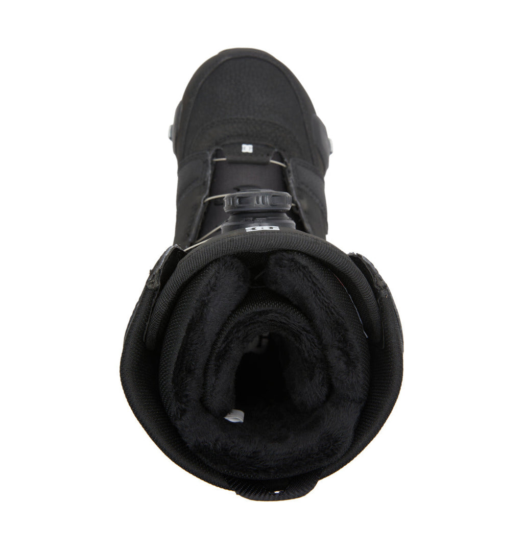 Top view of the Women’s Lotus Step On® Snowboard Boots by DC Shoes, featuring a black exterior with a fur-lined interior, sturdy sole, and lace-up front with the Dual Zone BOA Fit System, isolated on a white background.