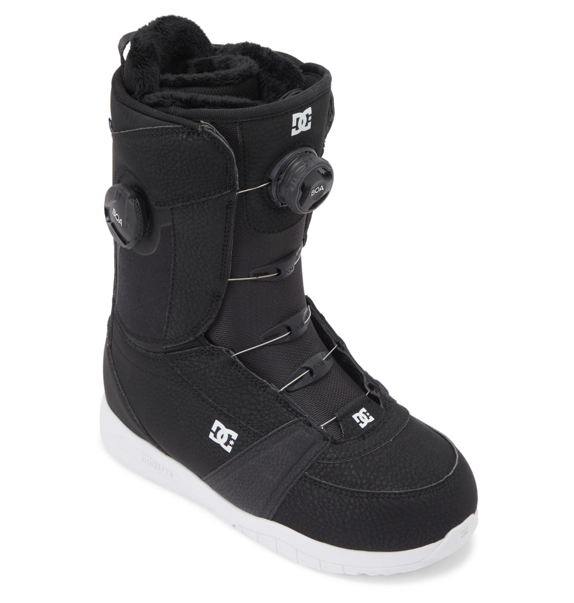 Introducing the Women’s Lotus BOA® Snowboard Boots by DC Shoes—a black boot with a white sole, featuring the Dual Zone BOA® Fit System for precise lacing adjustment and signature DC branding on the side and tongue. Designed for comfort and durability, it’s equipped with a lightweight UNILITE outsole.