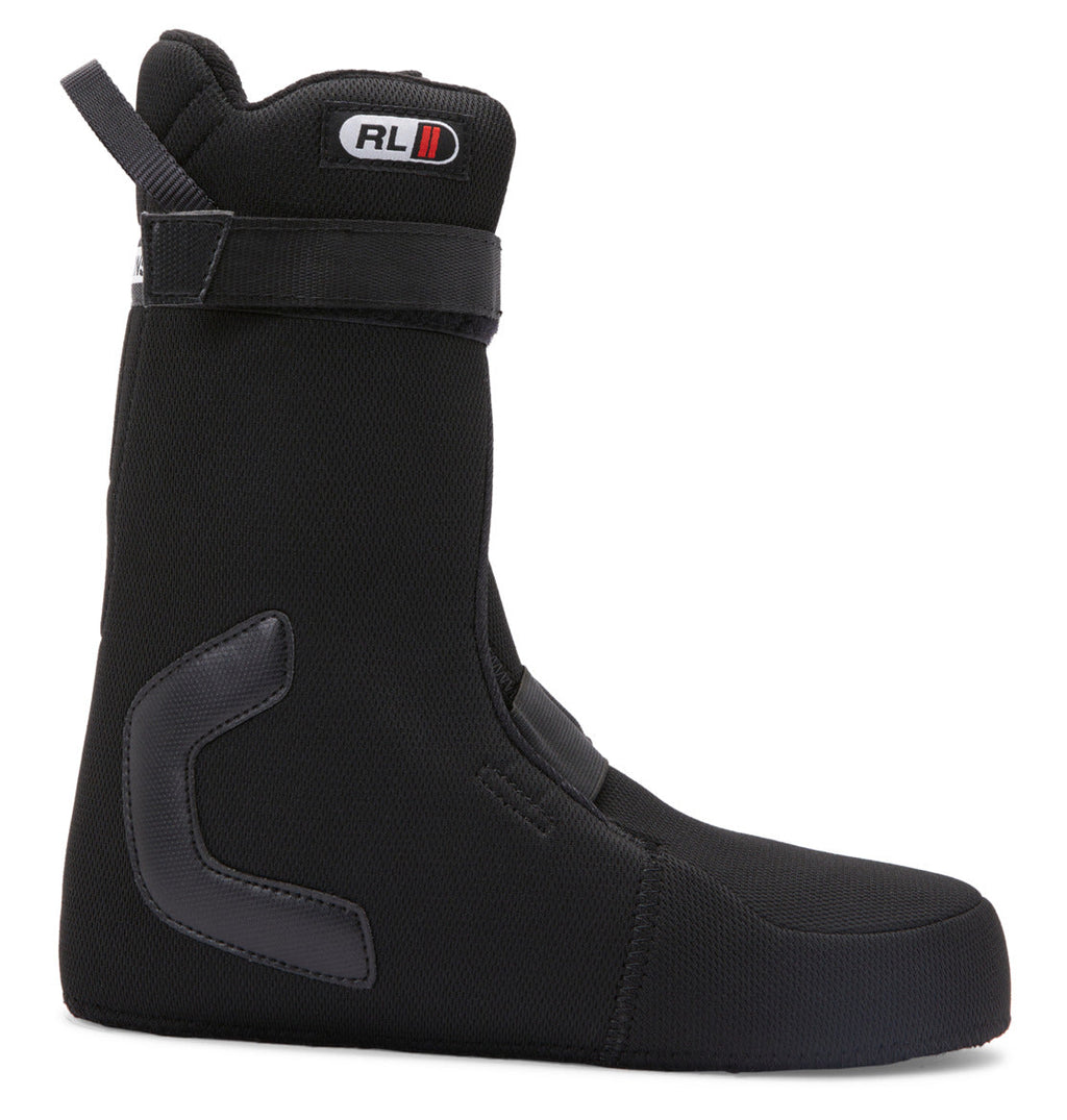 The DC Shoes Women's Lotus BOA® Snowboard Boots feature a high ankle, padded interior, Velcro top strap, and reinforced side and heel. Displayed in black from a side profile on a white background.