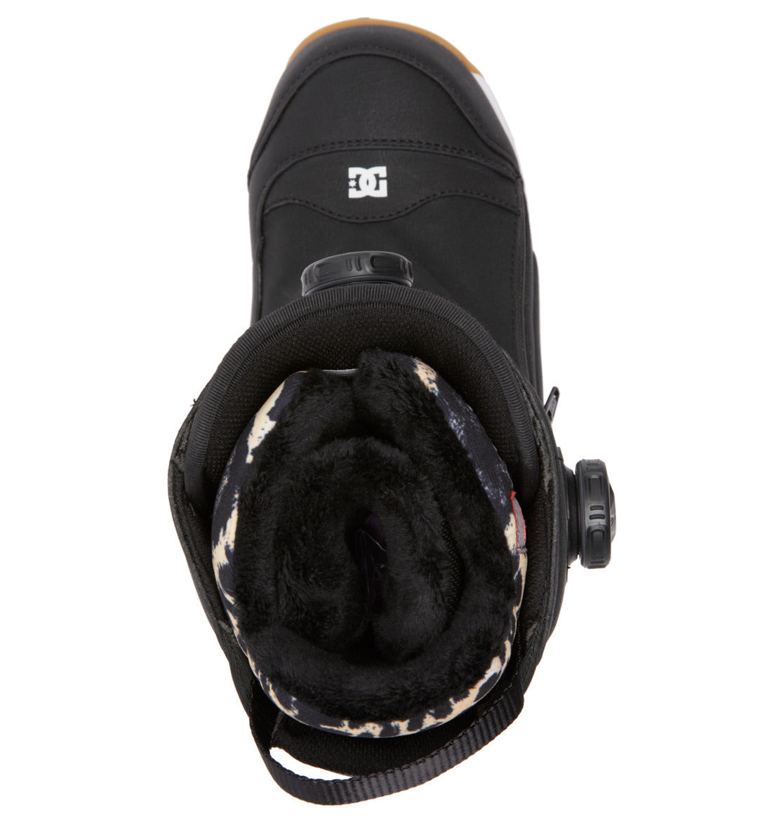 Top view of the Women’s Mora BOA® Snowboard Boot by DC Shoes, a black snowboarding boot featuring a plush, patterned inner lining with PrimaLoft insulation for superior warmth. The BOA Fit System dial is positioned on the side, and the DC Shoes logo is visible on the tongue.
