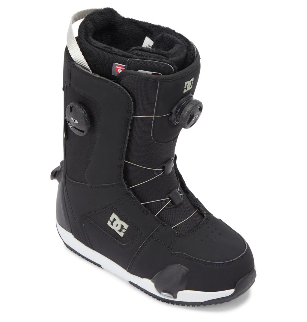 Introducing the DC Shoes Women’s Phase Pro Step On BOA® Snowboard Boots—a black women’s snowboard boot with white accents, featuring the BOA® Fit System dial lacing and the signature DC logo on the side. Designed with a sturdy sole and padded interior, these boots provide excellent comfort and support.