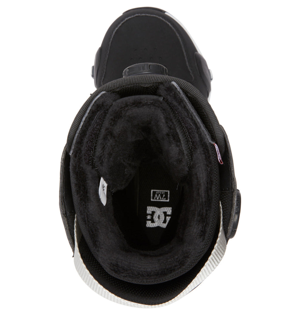 Top-down view of the DC Shoes Women’s Phase Pro Step On BOA® Snowboard Boot in black, featuring plush inner lining, the DC logo on the insole, and thick, cozy ankle padding—perfect for advanced women’s snowboarders seeking enhanced comfort and performance with the BOA® Fit System and Step On® model.