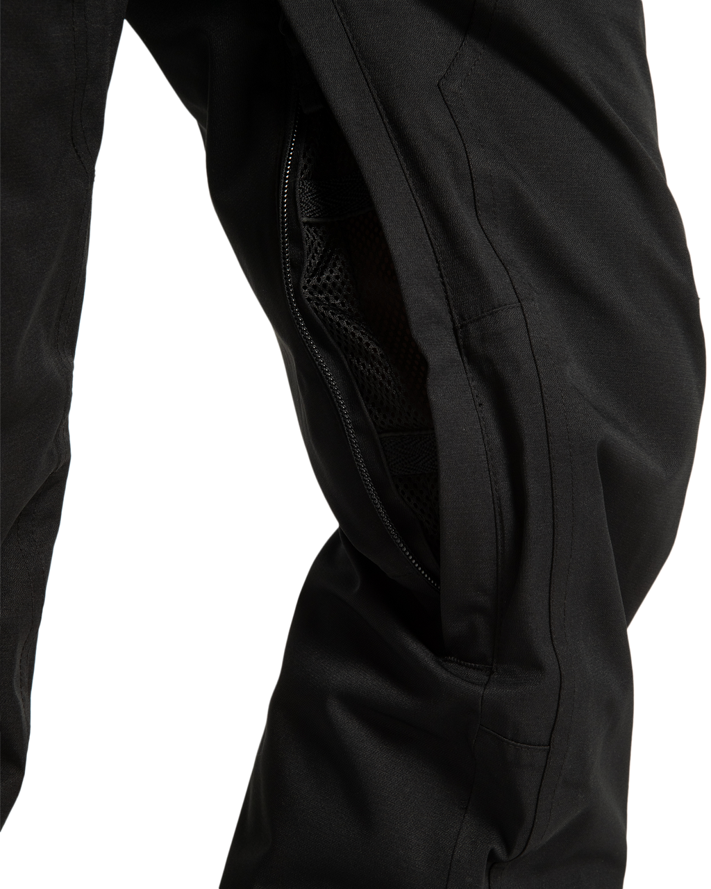 Close-up of black pants with an open zippered mesh vent along the side, revealing the inner lining—part of the DC Shoes Women’s Crusade Shell Bib collection, designed to deliver waterproof protection for women’s adventure gear.