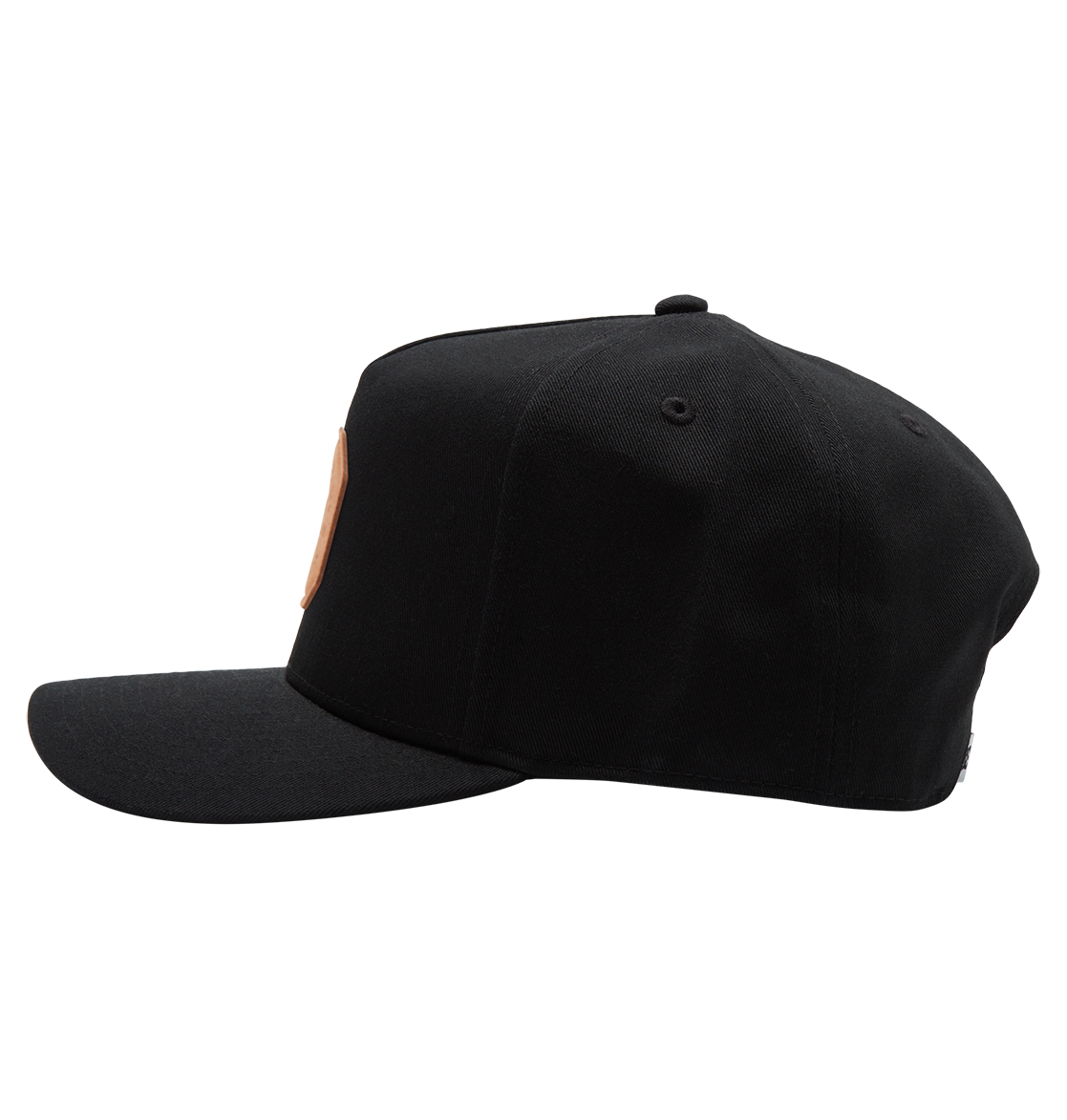 The Men's Reynotts Cap by DC Shoes is shown from the side against a white background, featuring a flat brim and a small round patch with subtle DC branding on the front.