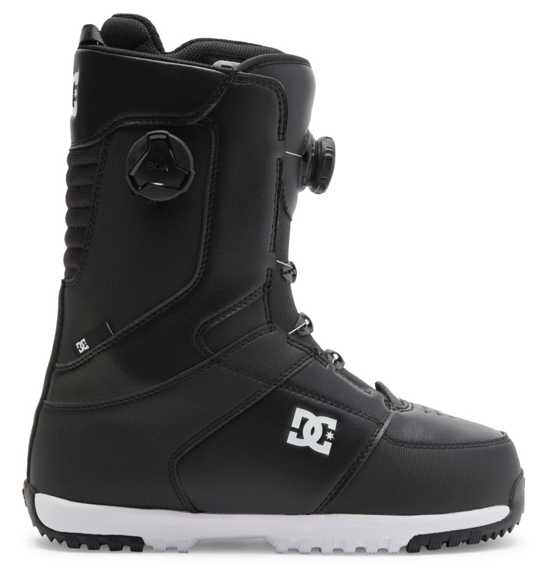 The Men’s Control BOA® Snowboard Boots by DC Shoes are shown in profile against a white background, featuring a black upper with a white sole, side BOA dial, reinforced stitching, and the DC logo on the side. These all-mountain boots utilize the Dual Zone BOA Fit System for precise adjustment and blend advanced snowboarding performance with signature DC skate style.