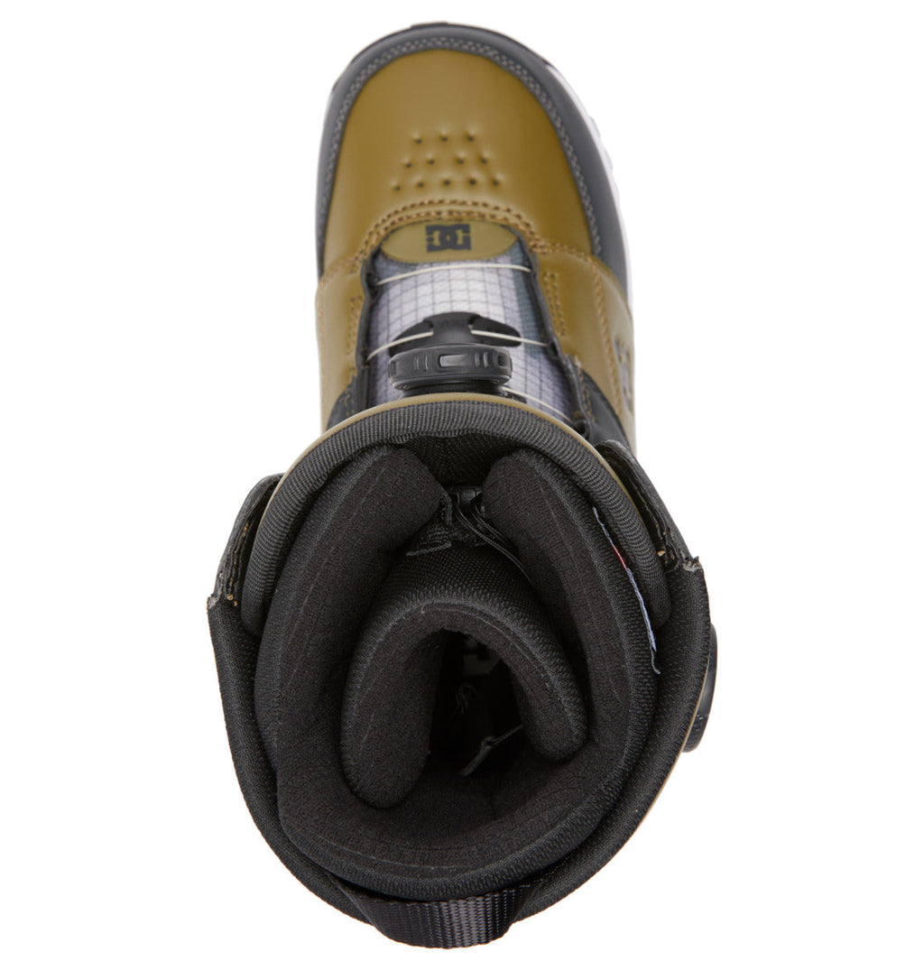 Top view of a single DC Shoes Men’s Control BOA® Snowboard Boot in olive green and black, featuring a padded interior and Dual Zone BOA® Fit System dial lacing, combining skate-inspired comfort with advanced all-mountain snowboarding technology.