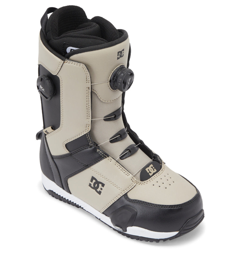The DC Shoes Men’s Control Step On BOA® Snowboard Boot is shown in beige and black on a white background, featuring advanced snow boot technology, a round BOA tightening system, black sole, and the DC logo on the side.