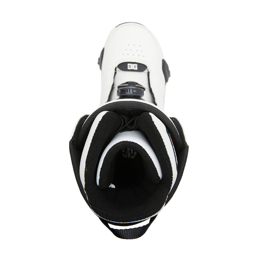 Top view of the DC Shoes Men’s Control Step On® Snowboard Boots in white and black, featuring a padded liner and a front dial adjustment mechanism with Dual Zone BOA Fit System innovation for precise comfort.