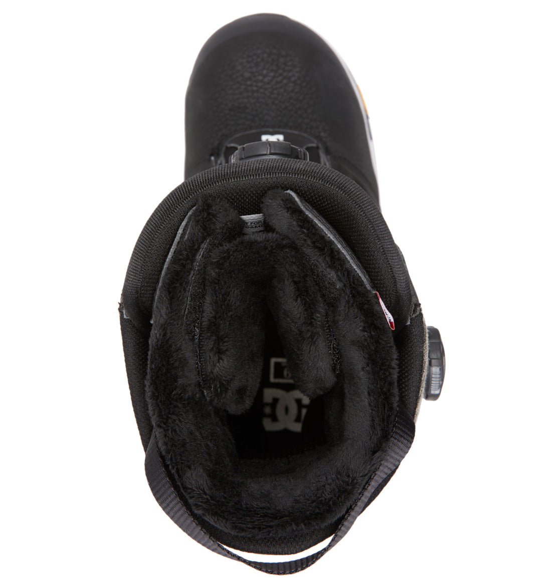 Top view of the DC Shoes Men’s Judge BOA® Snowboard Boots, showcasing a black winter style with a plush, furry inner lining and an easy-to-use round BOA® dial closure system on the side. Engineered for both performance and comfort, these boots feature a rugged Vibram outsole that delivers superior traction on icy terrain.