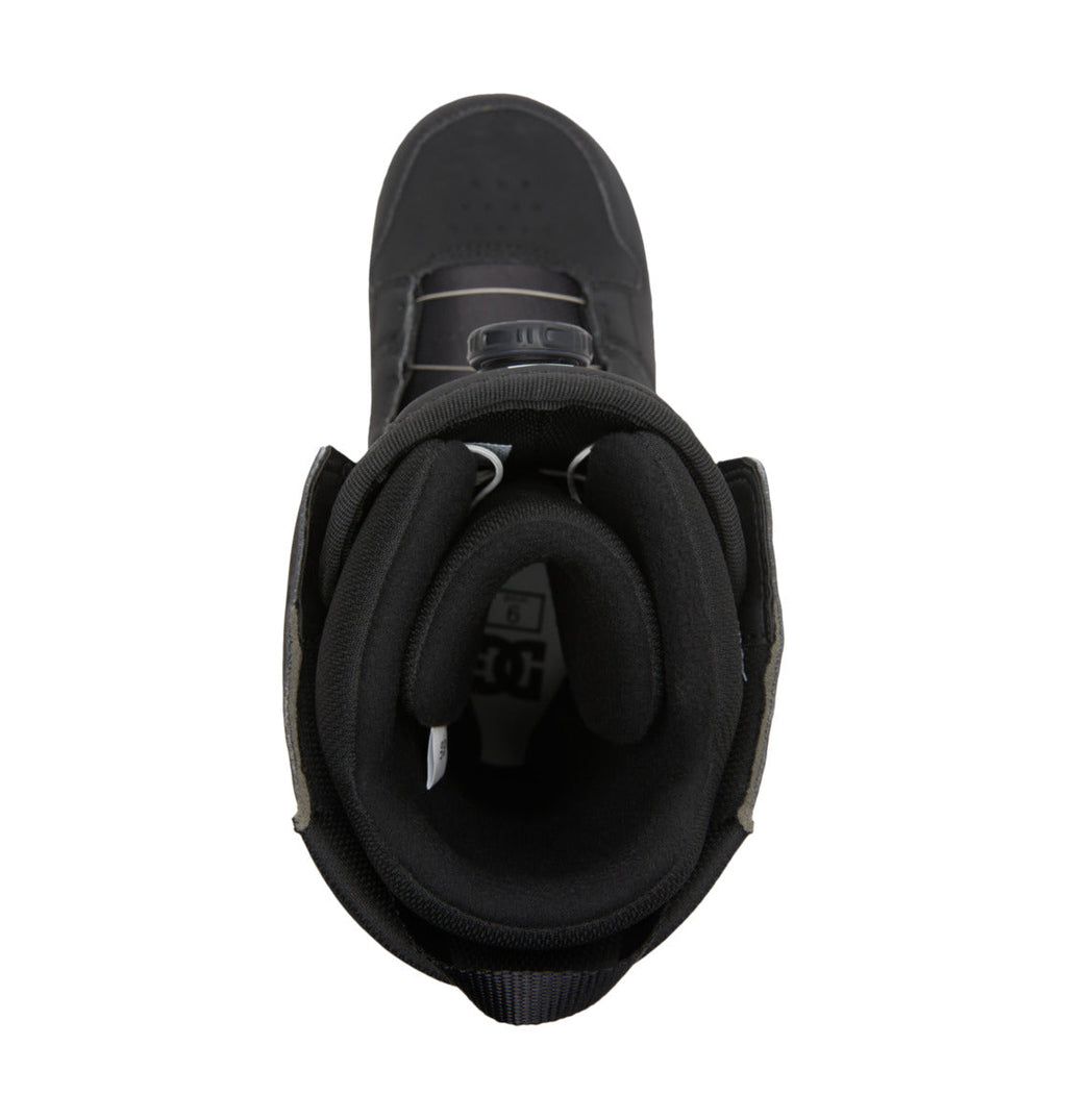 Top view of the Men’s Phase BOA® Snowboard Boot by DC Shoes, showcasing a thick padded collar, prominent tongue, and a DC Shoes logo on the insole. Engineered for optimal comfort, this boot features IMPACT-ALG insoles for superior cushioning.