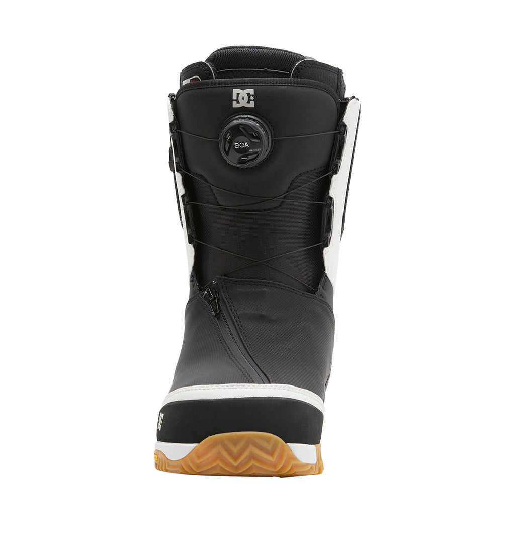 Front view of the Men’s Transcend BOA® Snowboard Boot by DC Shoes in black and white, featuring a textured brown sole and a BOA Fit System dial closure on the upper front.