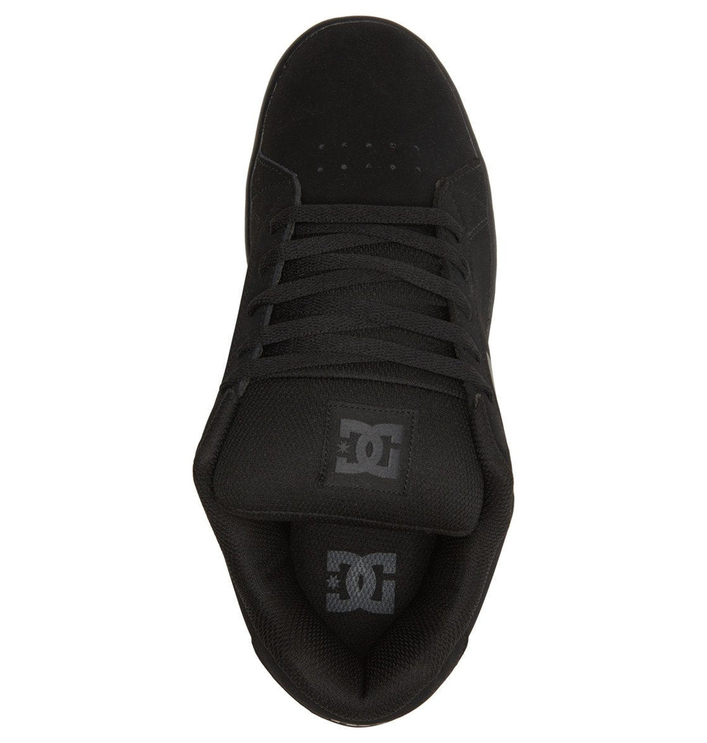 Top view of the Men’s Gaveler Shoes by DC Shoes in black, featuring black laces, perforations on the toe box, and prominent DC Shoes branding on both the padded tongue and insole—crafted from durable leather that defines the signature aesthetic of the Gaveler collection.
