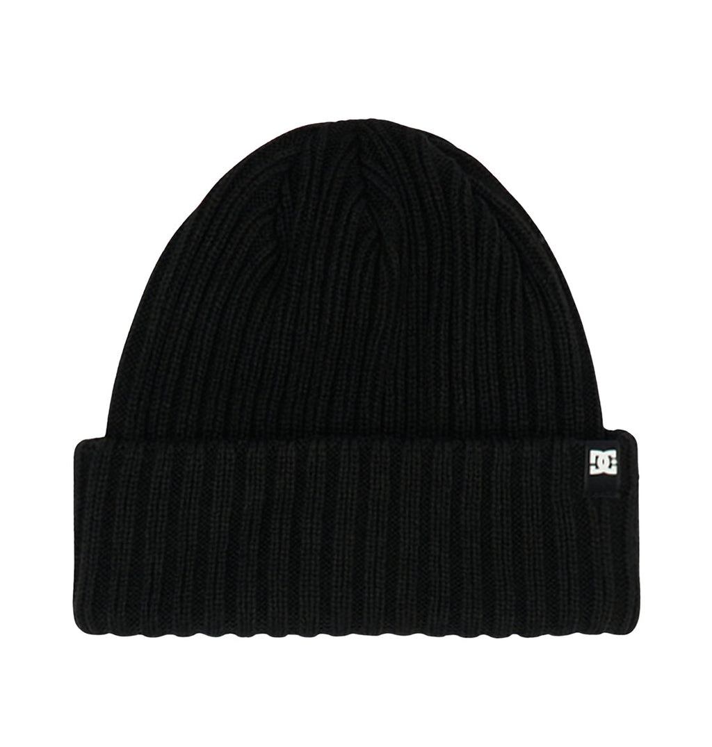 The Fish N Destroy Youth beanie by DC Shoes is a black ribbed knit hat featuring a folded brim and a small rectangular logo tag on the side. Made from comfortable knit fabric with recycled fibers, it is displayed against a plain white background.