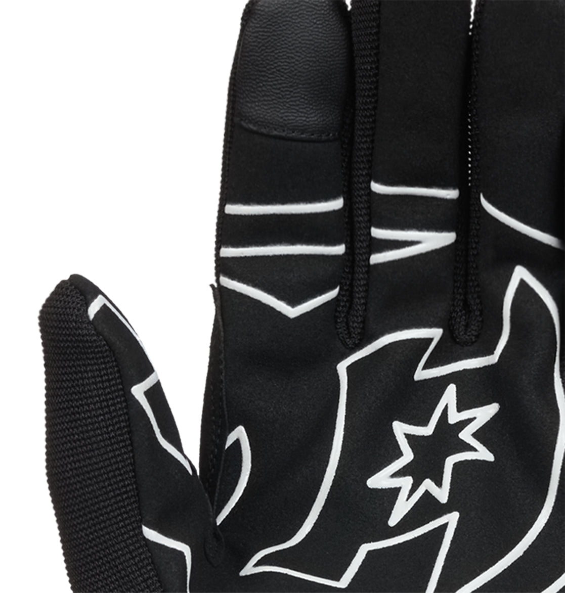 A close-up of the DC Shoes Trackstar Park Gloves in black, featuring distinctive white patterns and a star design on the back, showcases the palm side facing away and emphasizes their insulated warmth—making these snow gloves an ideal blend of style and comfort.