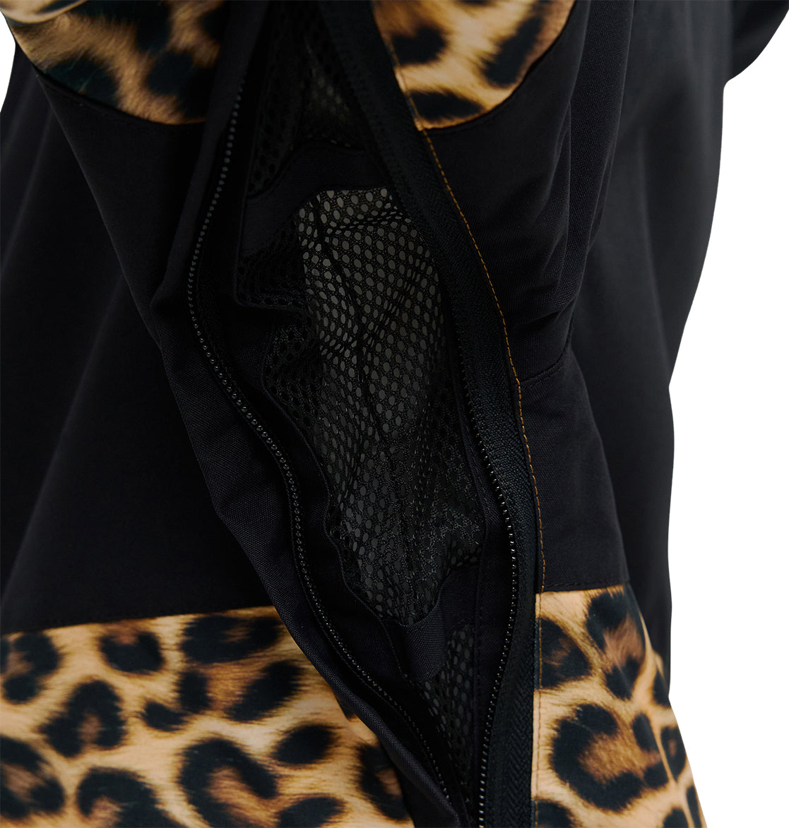 Close-up of the DC Shoes Cruiser Jacket in black, featuring a mesh zipper opening and leopard print accents along the edges.