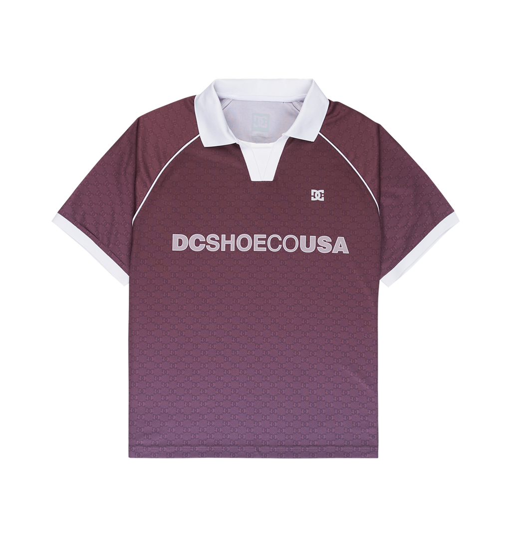 The Men's DC Soccer Top by DC Shoes is a maroon short-sleeve polo with a white collar and cuffs, DCSHOECOUSA across the chest, and a small DC logo on the left side for athletic style and everyday comfort.
