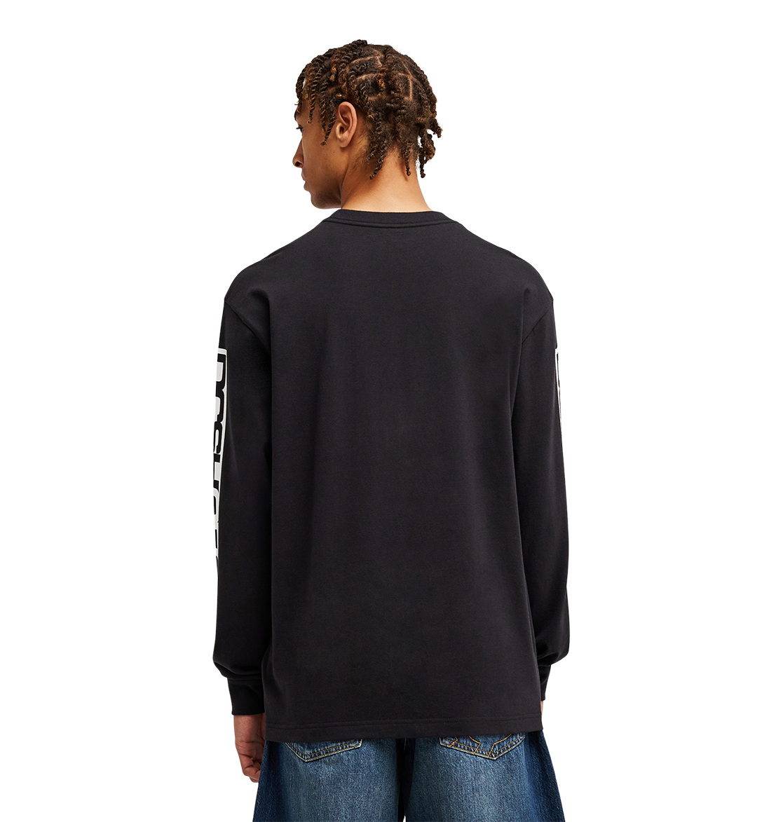 A person with short, braided hair is seen from behind against a plain light background, wearing the Men's DC Echo Tee by DC Shoes—a black graphic T-shirt with bold white sleeve text—paired with blue jeans, perfectly styled for laid-back skate sessions or casual hangouts.